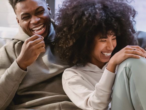 Man and woman looking at phone