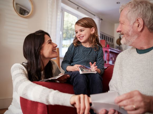 Mother, daughter and grandad in their home