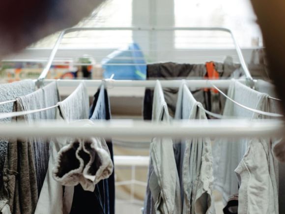 drying clothes inside the home on a rack 