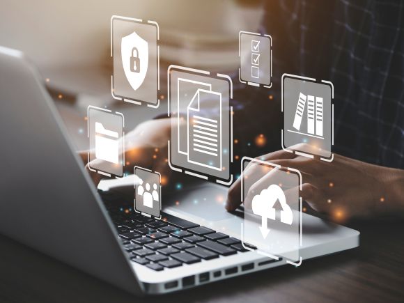 Person typing on a computer