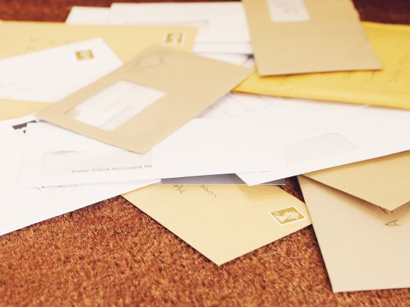 Pile of letters on a doormat