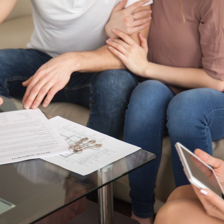 Couple signing a new rent agreement