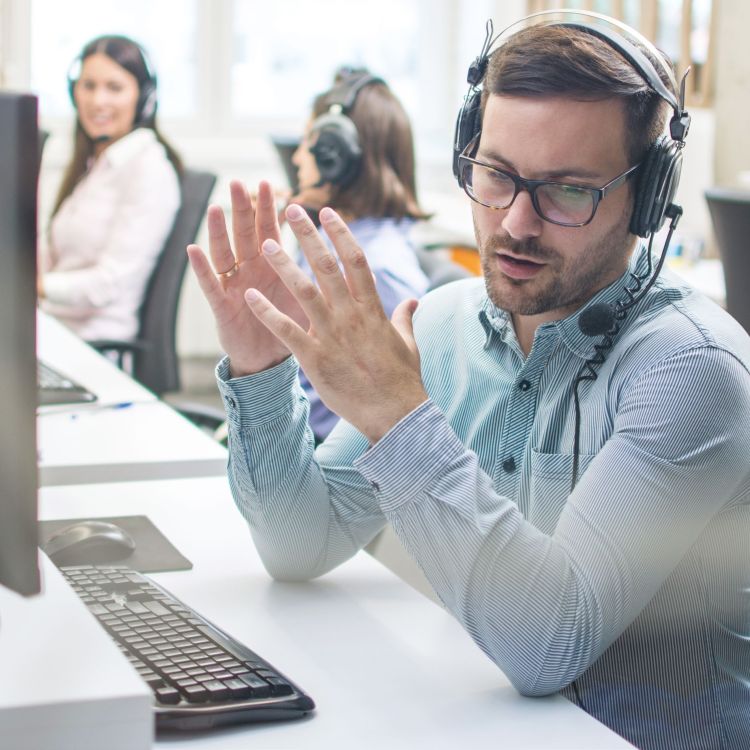 a call center operative talking on the phone