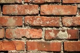 Penetrating damp - loss of mortar in the brickwork joints