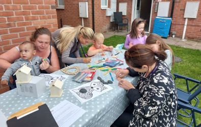 People sat outside during a platform communities connected event