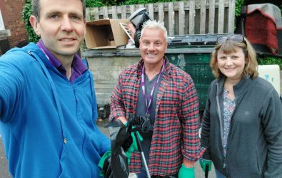 Colleagues and customers litter picking