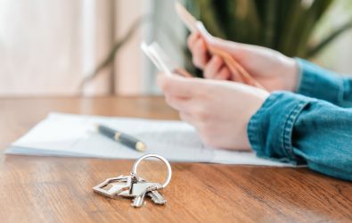 Keys and paperwork on a table 