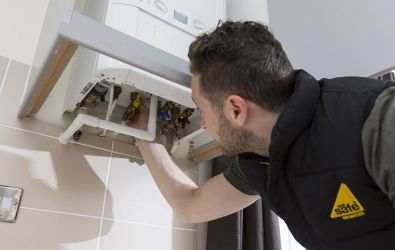 An engineer checking a boiler