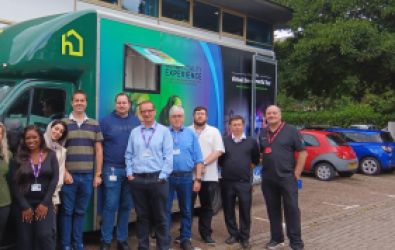 Colleagues outside the autism bus