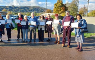 Customers with their certificates