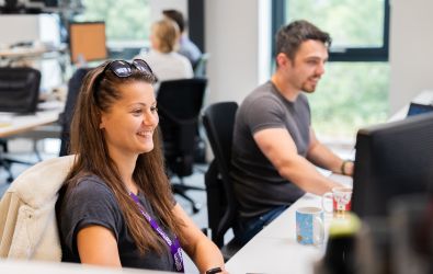 Colleagues using technology