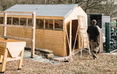 The new shed in the community garden being built