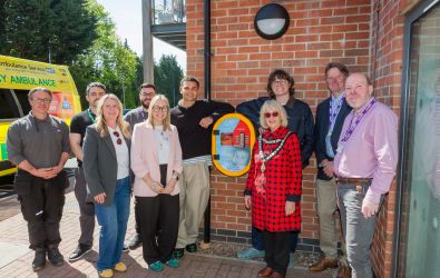 Representatives by the defibrillator at Clarence Park in Malvern