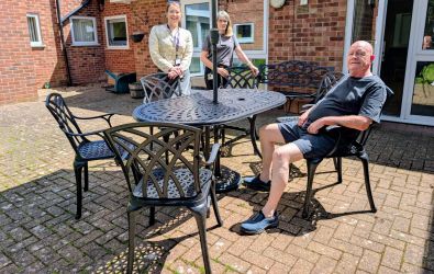 Residents and colleagues with the new garden furniture