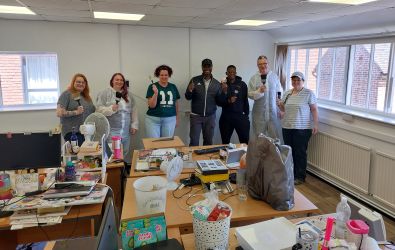 Colleagues decorating the charity's office